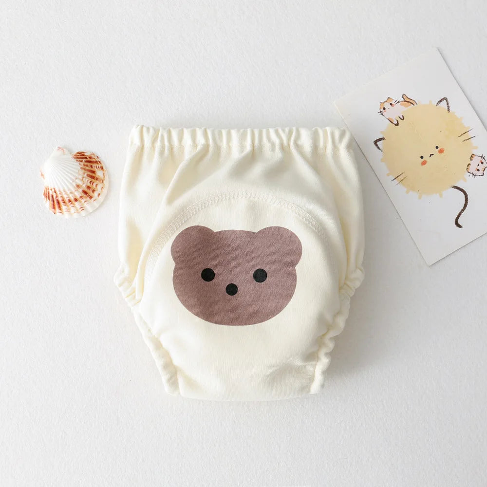 Parwani reusable baby training pants in cream with cute brown bear face design