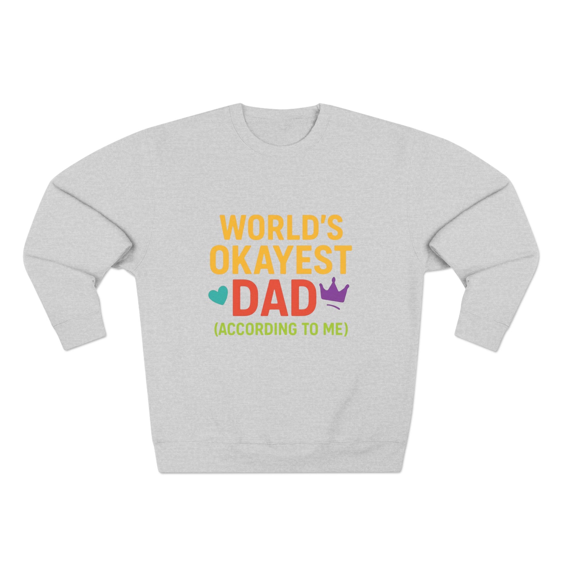 Gray sweatshirt with colorful text 'World's Okayest Dad (According to Me)' on a white background